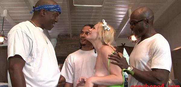  Sexy blonde babe banged by black guys in many positions